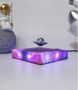 MINI SOUCOUPE EN LEVITATION SUR BASE LUMINEUSE GALAXIE